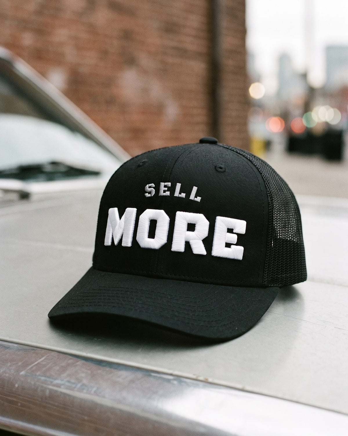 The Sell More Cap, close-up of the puff embroidery