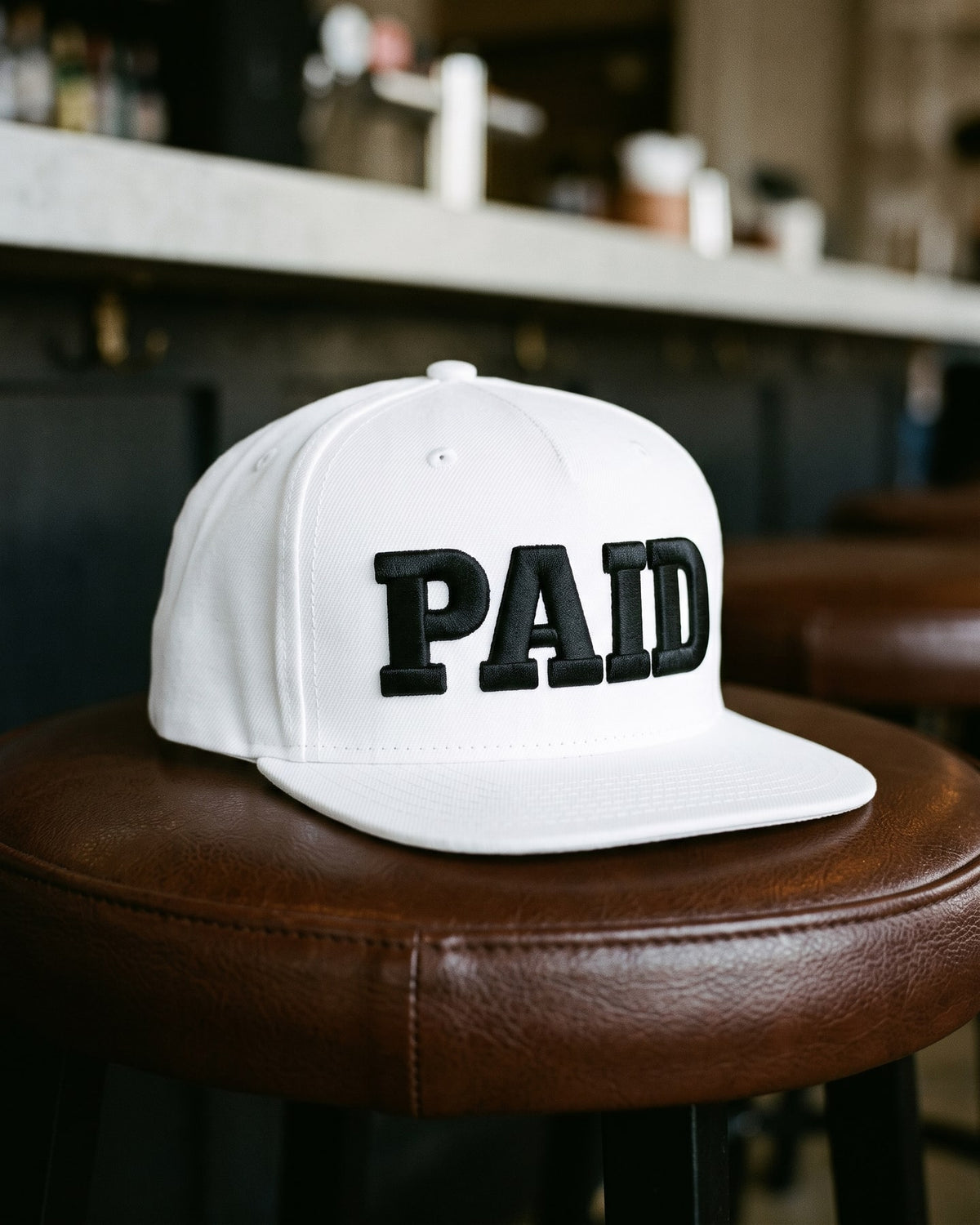The Paid In Full Cap, close-up of the puff embroidery