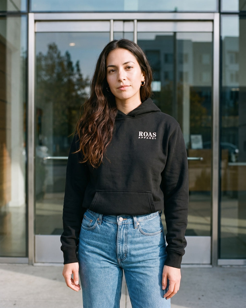 The Overdeliver Hoodie, worn front