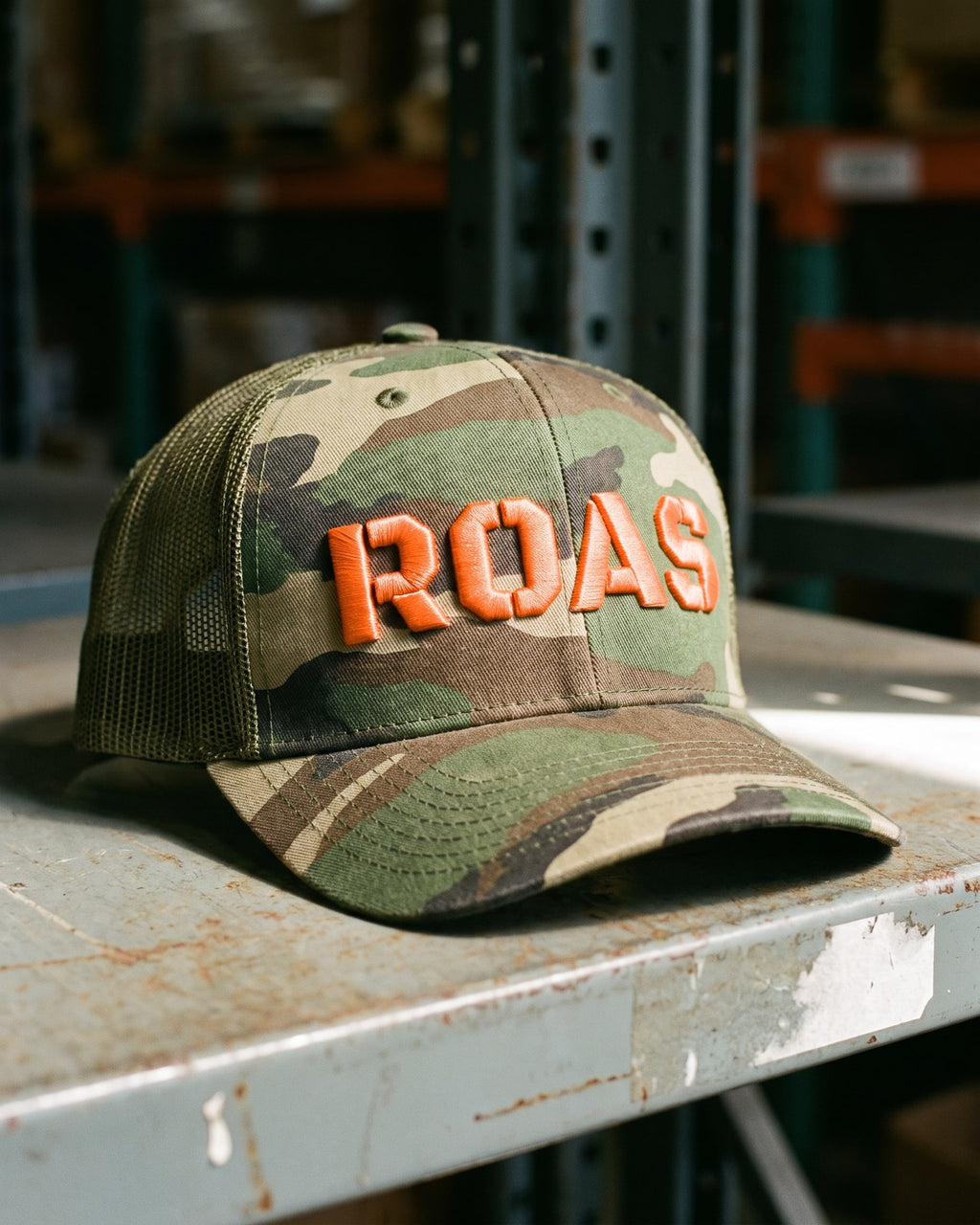 The ROAS Camo Trucker, close-up of the puff embroidery