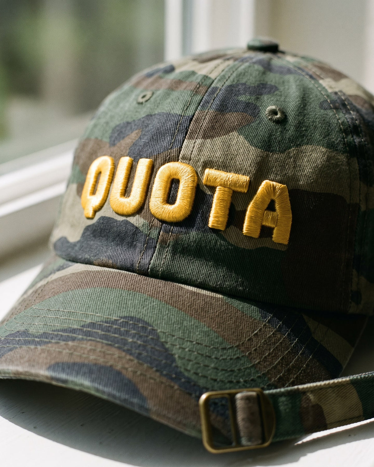The Quota Cap, close-up of the puff embroidery