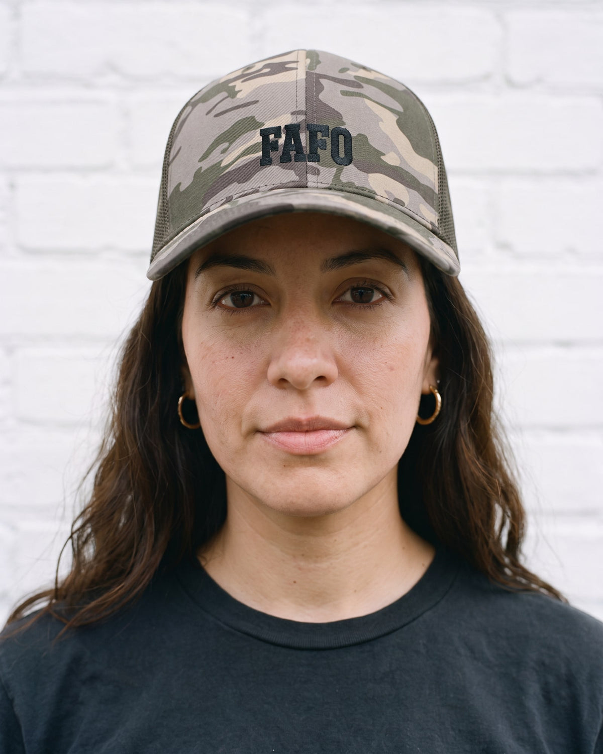 The FAFO Camo Trucker, worn close-up