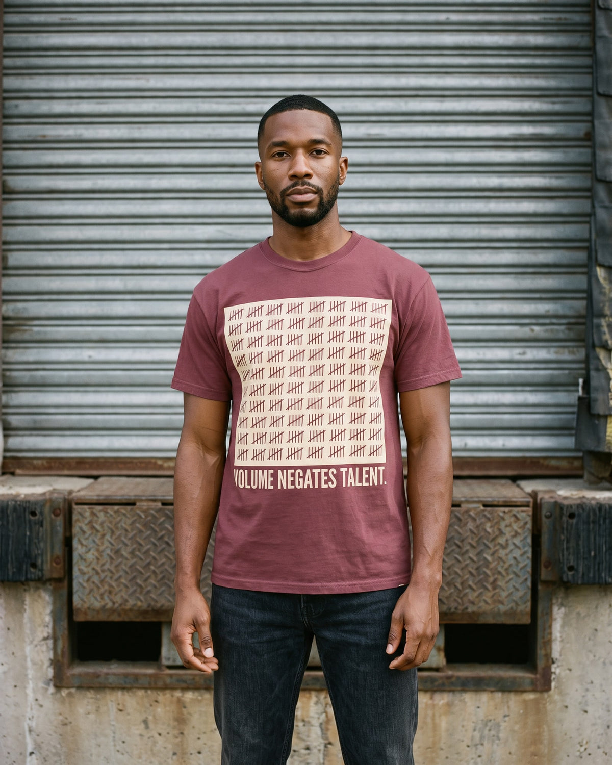 The Volume Negates Talent Tee, worn